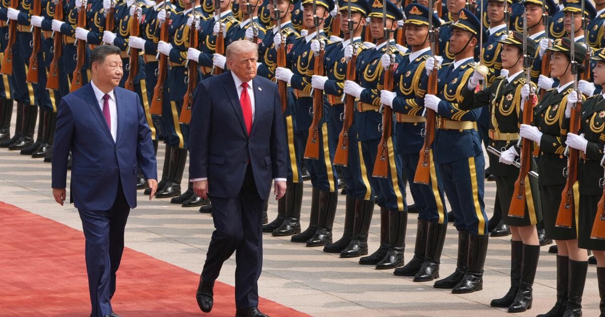 China's Xi, warning of a clash, tells Trump: 'We must make it work'